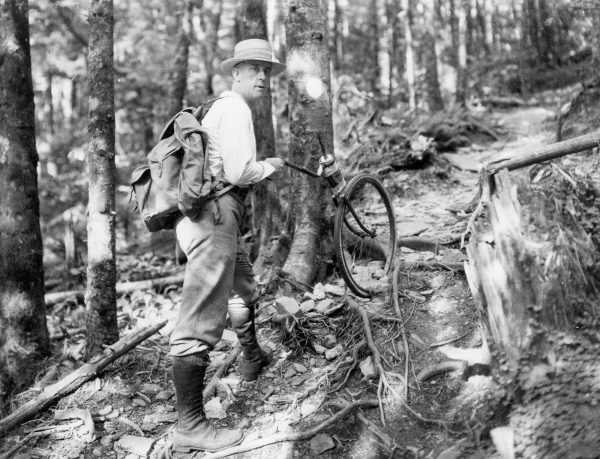 Knoxville photographer Jim Thompson measures a trail in the Great Smoky Mountains, likely during the 1930s. Photo provided by Thompson Photograph Collection, Calvin M. McClung Historical Collection, Knox County Public Library.